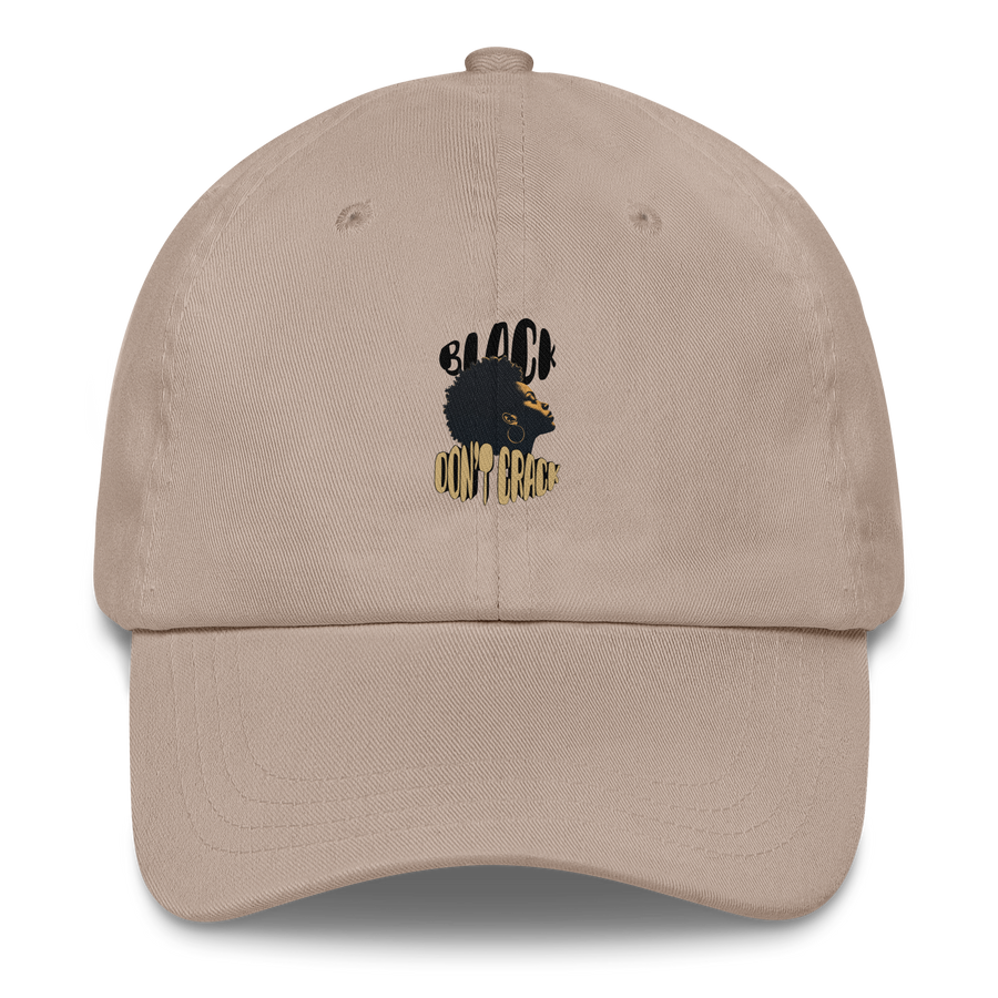 Black Don't Crack embroidered on a stone dad hat, front view