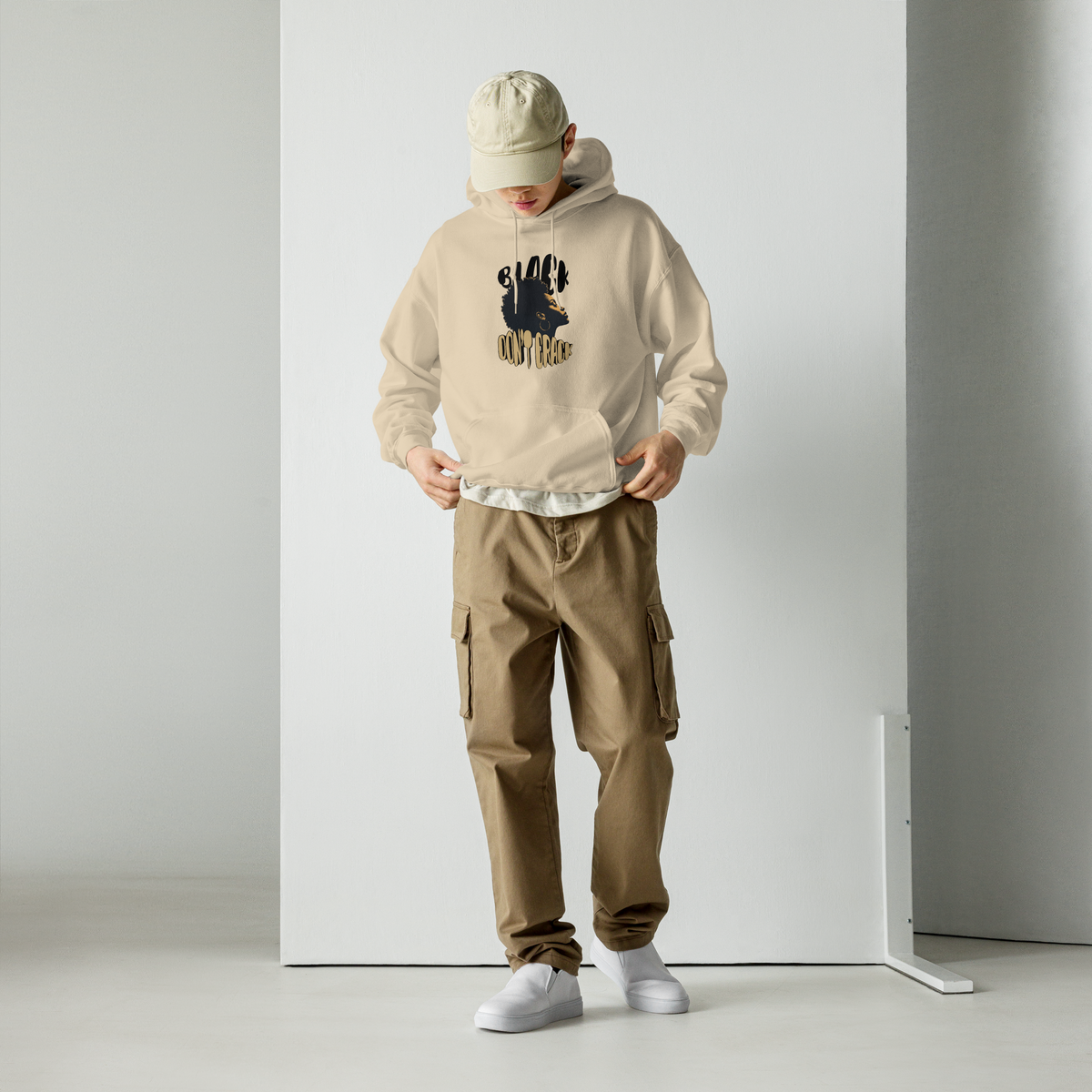 Black Don't Crack on a sand hoodie, front view